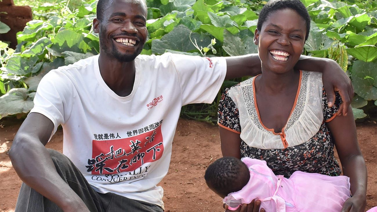 a man, woman and child